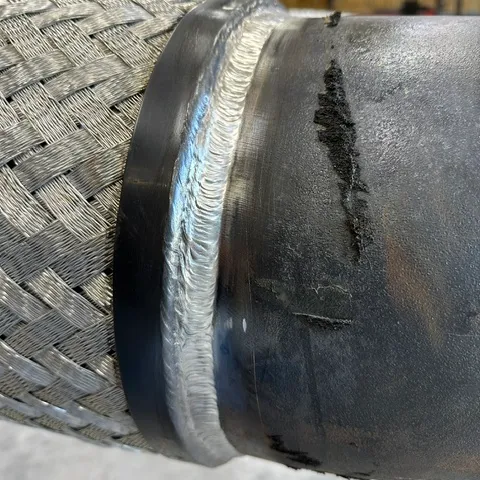 Clean pipe weld bead close-up